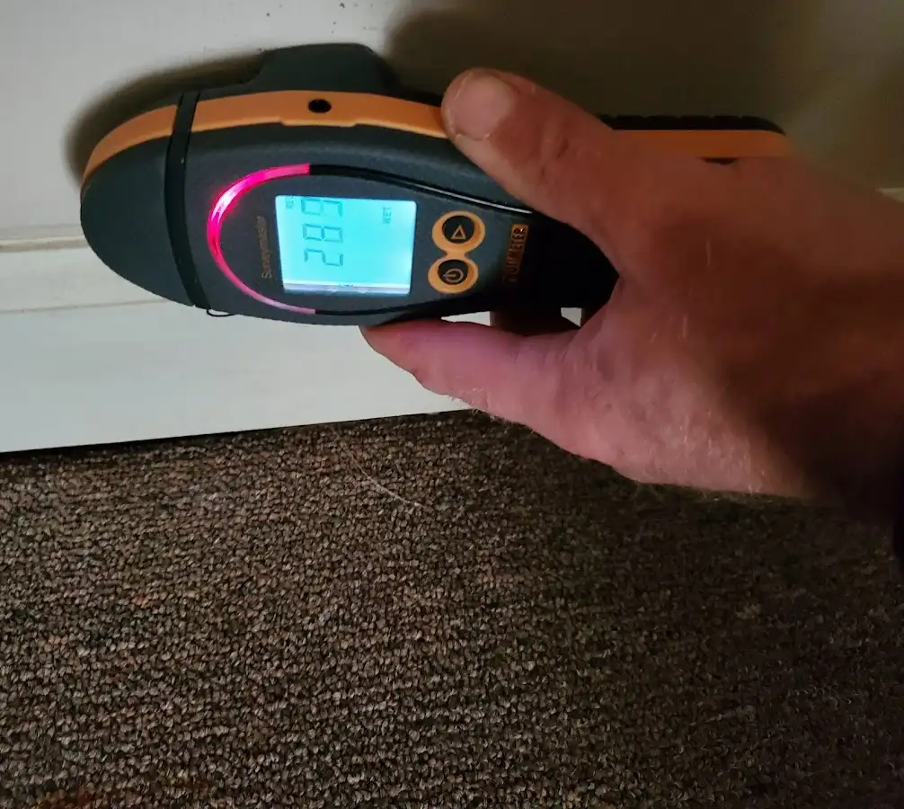 Moisture detection at baseboard during Mold Inspection & Testing in Opa-locka